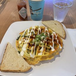 Linguica Womelette with spinach and a Greek iced coffee