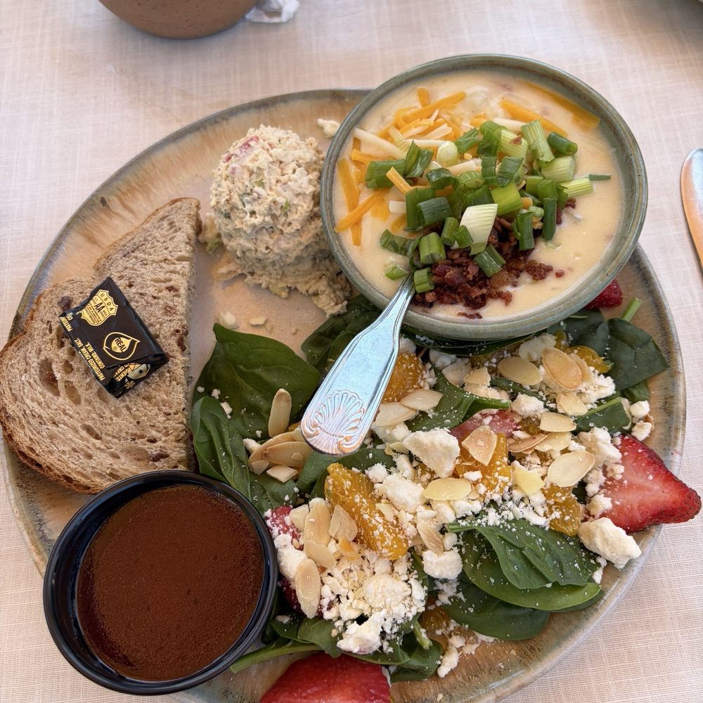 Old Mill Pottery House Cafe - Soup and salad: loaded baked potato soup, strawberry spinach salad, and scoop of chicken salad - American Near Me - Pigeon Forge, Tennessee Old Mill Pottery House Cafe - Soup and salad: loaded baked potato soup, strawberry spinach salad, and scoop of chicken salad - American Near Me - Pigeon Forge, Tennessee