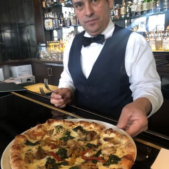 Spago - Rockstar Rogelio with my Spago spicy chicken pizza - New American Near Me - Beverly Hills, California Spago - Rockstar Rogelio with my Spago spicy chicken pizza - New American Near Me - Beverly Hills, California