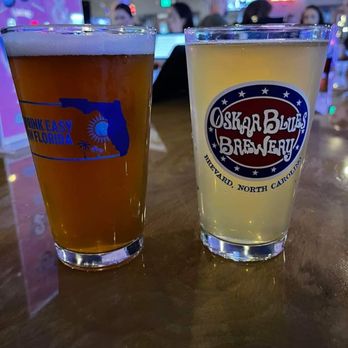 Dart Bar & Games - two glasses of beer - Beer Bar Near Me - Jacksonville, Florida
