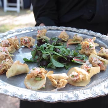 Page Barteau Catering - Fried oyster nacho on yucca chip with guacamole passed hors doeuvres - Caterers Near Me - San Antonio, Texas Page Barteau Catering - Fried oyster nacho on yucca chip with guacamole passed hors doeuvres - Caterers Near Me - San Antonio, Texas