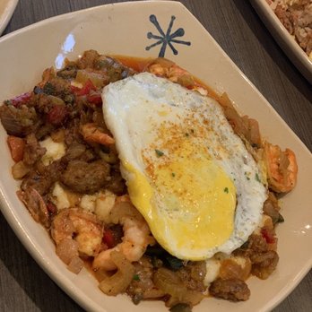 Snooze, an A.M. Eatery - shrimp and grits with egg hard over - Breakfast & Brunch Near Me - Boulder, Colorado Snooze, an A.M. Eatery - shrimp and grits with egg hard over - Breakfast & Brunch Near Me - Boulder, Colorado