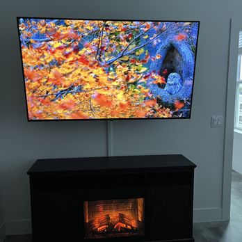 The Houston Handyman Solution - Beautiful TV mounting service. With apartment friendly wire hiding. - Handyman Near Me