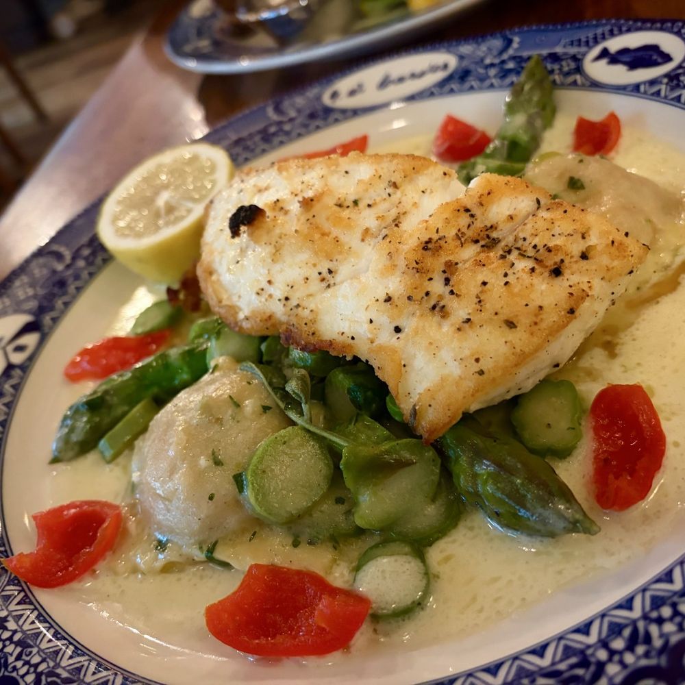 MoCo's Founding Farmers - Seared halibut prepared Lemon butter style - New American Near Me - Potomac, Maryland MoCo's Founding Farmers - Seared halibut prepared Lemon butter style - New American Near Me - Potomac, Maryland