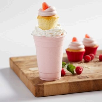 Bytes Arcade + Eatery - a cupcake with whipped cream and strawberries - Arcades Near Me - Spring, Texas