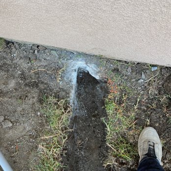 ABM Security Cameras - cutting cement - Home Network Installation Near Me