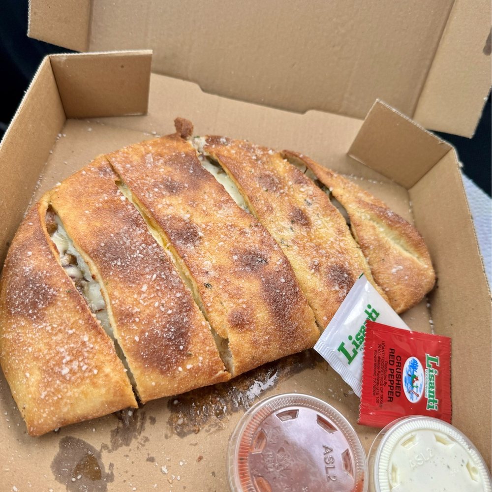 Romanos Pizza - "Small",Calzone! It's actually quite large! - Italian Near Me - Lake Dallas, Texas