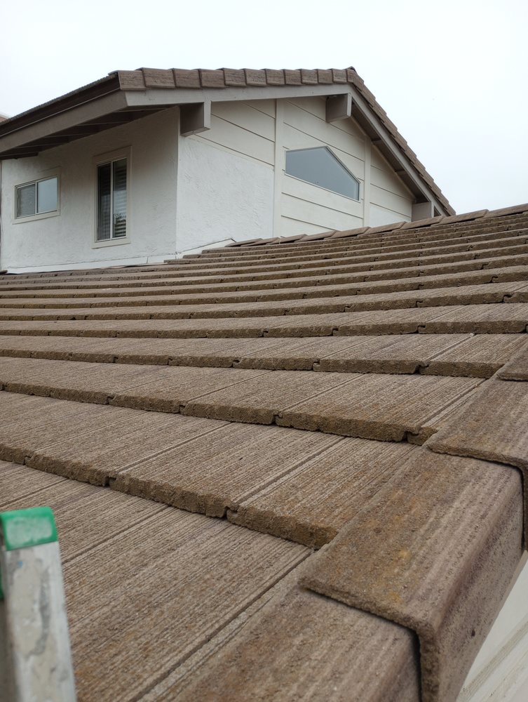 Slide of Do It Now Roofing