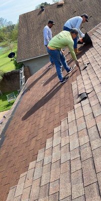 RainTight Roofing Logo