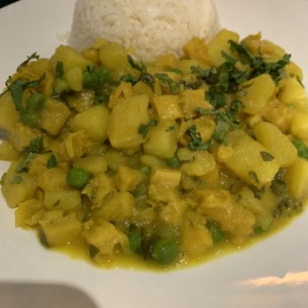 Sol Inca - a plate of food with rice and peas - Peruvian Near Me - Jackson Heights, New York Sol Inca - a plate of food with rice and peas - Peruvian Near Me - Jackson Heights, New York