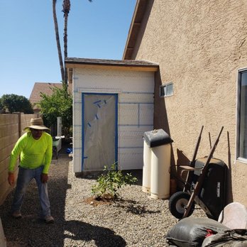 JYK construction Company - man working on a house - Painters Near Me - Phoenix, Arizona JYK construction Company - man working on a house - Painters Near Me - Phoenix, Arizona