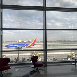 LAX Terminal 1 - Seating area and the end of the concourse by gate 210