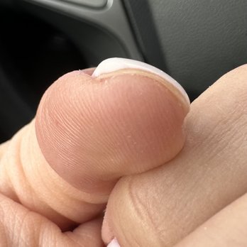 Nails LaBelle - That is polish- so thick on the left and see this the polish does not go the end of my nail???? (Done by Casey/Kasey) - Nail Salons Near Me - Park City, Utah Nails LaBelle - That is polish- so thick on the left and see this the polish does not go the end of my nail???? (Done by Casey/Kasey) - Nail Salons Near Me - Park City, Utah