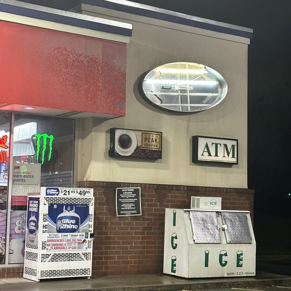 Tru Buy Exxon - a storefront at night - Gas Stations Near Me - Greensboro, North Carolina Tru Buy Exxon - a storefront at night - Gas Stations Near Me - Greensboro, North Carolina