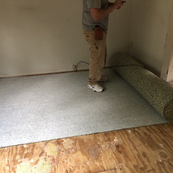 Molyneaux Home - Felt pad under layer being rolled out. - Flooring Near Me - Pittsburgh, Pennsylvania