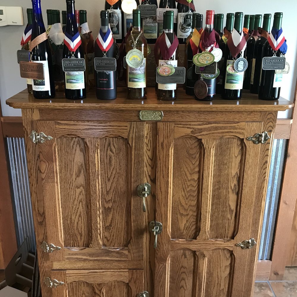 Feather River Winery - wine bottles on top of a cabinet - Wineries Near Me - North Platte, Nebraska