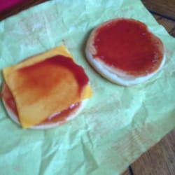 McDonald's - Apparently this is a cheeseburger with just ketchup. When taken back they laughed and said " it happens " . They are dumb. Ew.