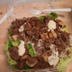 Supreme Pizza - This is what you get when you order Steak Caesar Salad. Shaved steak on lettuce with croutons.