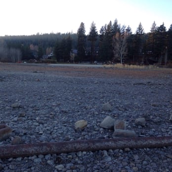 Commons Beach - All dried up. White patch is where the water should be - Parks Near Me