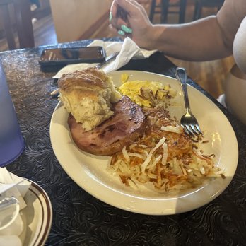 Strayhorn Grill - The  strayhorn ham, eggs and hash browns and look at that homemade biscuit. - American Near Me - Fruita, Colorado