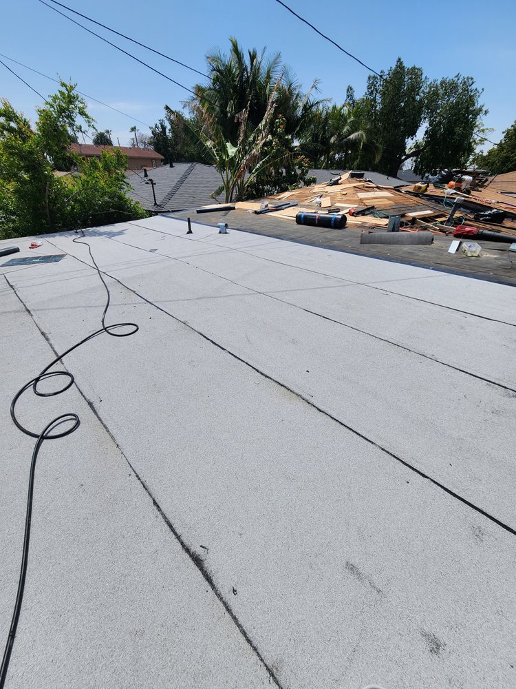 Slide of Pro Roofing Experts