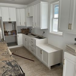 Johnson's Gifted Hands - Cabinet casing doors an knobs installed