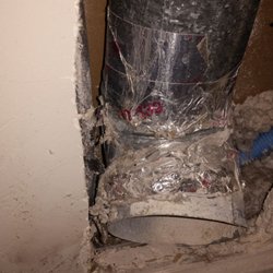 Green Home Dryer Vent Cleaning - Replacing broken elbow in wall.