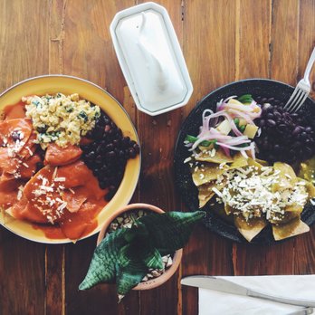 Tulumski - Breakfast chilaquiles, eggs and beans! A Mexican classic, you can't go wrong! The red and green tomato sauces are outstanding! - Fast Food Near Me - Tulum, ROO