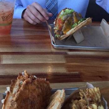 Bruxie - My buttermilk chicken waffle sandwich adjacent to a burger - Sandwiches Near Me - Orange, California Bruxie - My buttermilk chicken waffle sandwich adjacent to a burger - Sandwiches Near Me - Orange, California