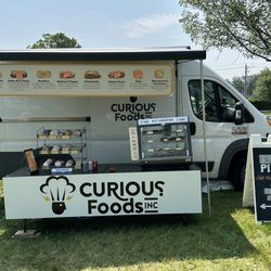 Curious Foods - Fresh baked Hand pie and oat cake Food truck shown at Fredericton Highland Games. Can also be found at Garson Night Market on certain dates.