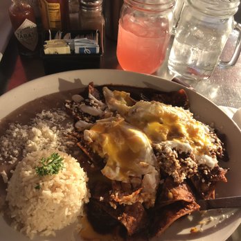 Cafe De Olla - Chilaquiles Aztecas with eggs over easy and beans and rice. - American Near Me - Burbank, California Cafe De Olla - Chilaquiles Aztecas with eggs over easy and beans and rice. - American Near Me - Burbank, California