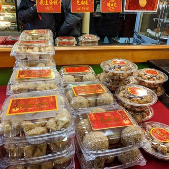 Fay Da Bakery - Sesame balls, fried dough, and flower cakes for sale, just in time for Chinese New Year. Good for gifting. - Bakeries Near Me - Forest Hills, New York
