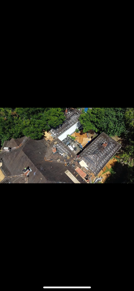 Slide of Capstone Roofing
