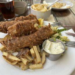 Fish & Fish n Chips with kids mac n cheese in the back Fish & Fish n Chips with kids mac n cheese in the back