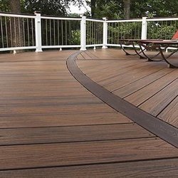 Brown trex with curved finish
White railing black balusters with black caps