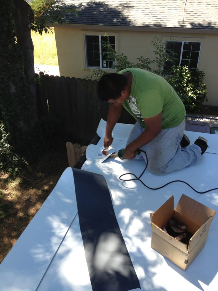 Slide of River City Roofing