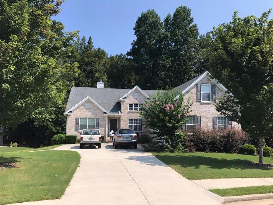 Slide of Champion Roofing