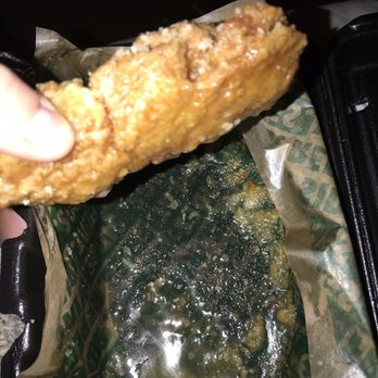 Wingstop - Second picture of the remaining oil after being drained from the container 3 times. - Chicken Wings Near Me - Citrus Heights, California