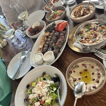 Ammatoli - Hummus Topped with Shawarma Falafel Mezza Greek Salad Grilled Kebab Plate Foul Mudammas Mezza - Mediterranean Near Me - Long Beach, California