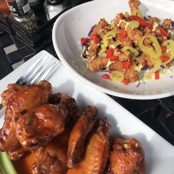 The Waterfront Hotel - WTF wings - Sriracha Honey Fried Calamari - New American Near Me - Baltimore, Maryland The Waterfront Hotel - WTF wings - Sriracha Honey Fried Calamari - New American Near Me - Baltimore, Maryland