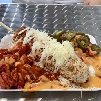 Bandoleros Neveria - Elote with hot Cheetos and cheese - Ice Cream & Frozen Yogurt Near Me - Westminster, Colorado Bandoleros Neveria - Elote with hot Cheetos and cheese - Ice Cream & Frozen Yogurt Near Me - Westminster, Colorado