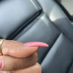 Cabana Nails & Waxing - This is not almond shape. poorly shaped nails. I asked her to fix and she couldn't.