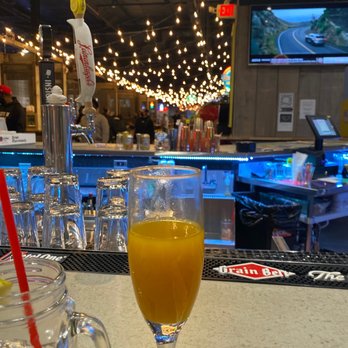 Fair on 4 - a glass of orange juice on a bar - Salad Near Me - Bloomington, Minnesota Fair on 4 - a glass of orange juice on a bar - Salad Near Me - Bloomington, Minnesota