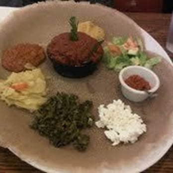 Kaffa Crossing - ethiopian vegetarian plate and kitfo - Ethiopian Near Me - Philadelphia, Pennsylvania Kaffa Crossing - ethiopian vegetarian plate and kitfo - Ethiopian Near Me - Philadelphia, Pennsylvania