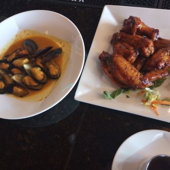 Flambo Restaurant - Wings and mussels muscles delicious wings tasty the wings needed the meat to be seasoned you can't leave it up to the sauce - Trinidadian Near Me - Sarasota, Florida