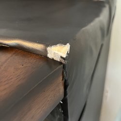 Best Deal Movers - The torn leather on the couch.