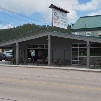 Mt Rushmore Brewing - Front view with outdoor seating - Brewpubs Near Me - Custer, South Dakota Mt Rushmore Brewing - Front view with outdoor seating - Brewpubs Near Me - Custer, South Dakota