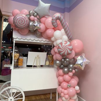 Blissfully Popped Popcorn - a candy cart decorated with balloons - Popcorn Shops Near Me - Maplewood, Missouri