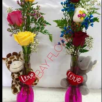 Garibay's Flowers - Glass "barbie" arrangement with choice of teddy bear with 3 roses. Please call for pricing details. - Gift Shops Near Me - Los Angeles, California Garibay's Flowers - Glass "barbie" arrangement with choice of teddy bear with 3 roses. Please call for pricing details. - Gift Shops Near Me - Los Angeles, California