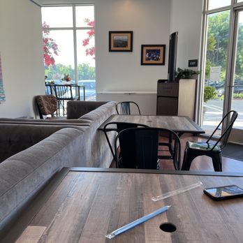 Tea Spot - Two tables where you can sit and two large couches inaccessible on the side - Sandwiches Near Me - Brentwood, California Tea Spot - Two tables where you can sit and two large couches inaccessible on the side - Sandwiches Near Me - Brentwood, California